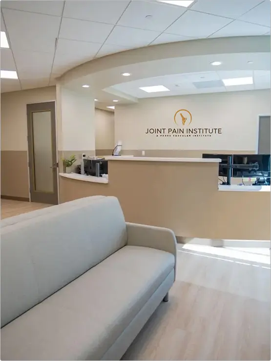 Welcoming waiting room at California Joint Pain Institute in Irvine, CA, offering minimally invasive joint pain treatments including embolization for knee osteoarthritis, tennis elbow, and frozen shoulder.