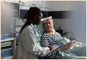 Doctor discussing GAE procedure details with a knee pain patient.